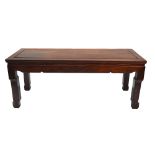 A Chinese hardwood rectangular stand or kang on four legs;