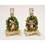 A pair of 19th century Meissen chamber sticks,