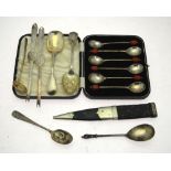 A cased set of six silver coffee spoons with red bean finials, to/w three small silver spoons,