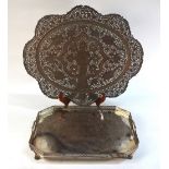 An electroplated wine tray with pierced gallery, on scroll feet,
