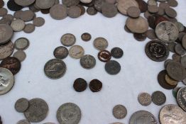 Two Roman coins together with other more modern coinage including crowns,