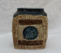 A Troika pottery vase of cube shape decorated with raised circles,