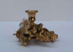 A continental gilt metal and crystal set candlestick,
