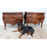 A pair of continental kingwood bombe commodes,