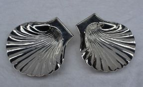 A pair of George III silver shell shaped dishes on shell feet, London, 1796, John Wirgman,