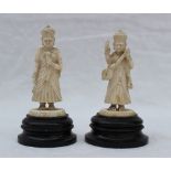 An Indian figure of Saraswati, holding a musical instrument together with another figure of a deity,