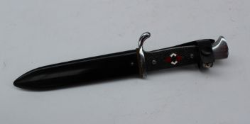 A Hitler youth dagger with a 5 1/2" blade marked RZM M7/33.