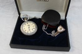 Allan Martin - A Seiko Elnix white metal (marked silver) open faced pocket watch,