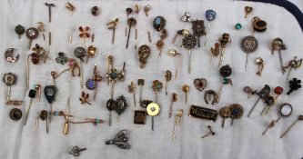 A collection of stick pins together with assorted costume jewellery including bracelets,