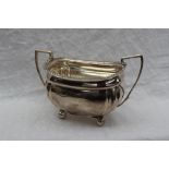 An Edward VII silver twin handled sugar basket, London, 1904,