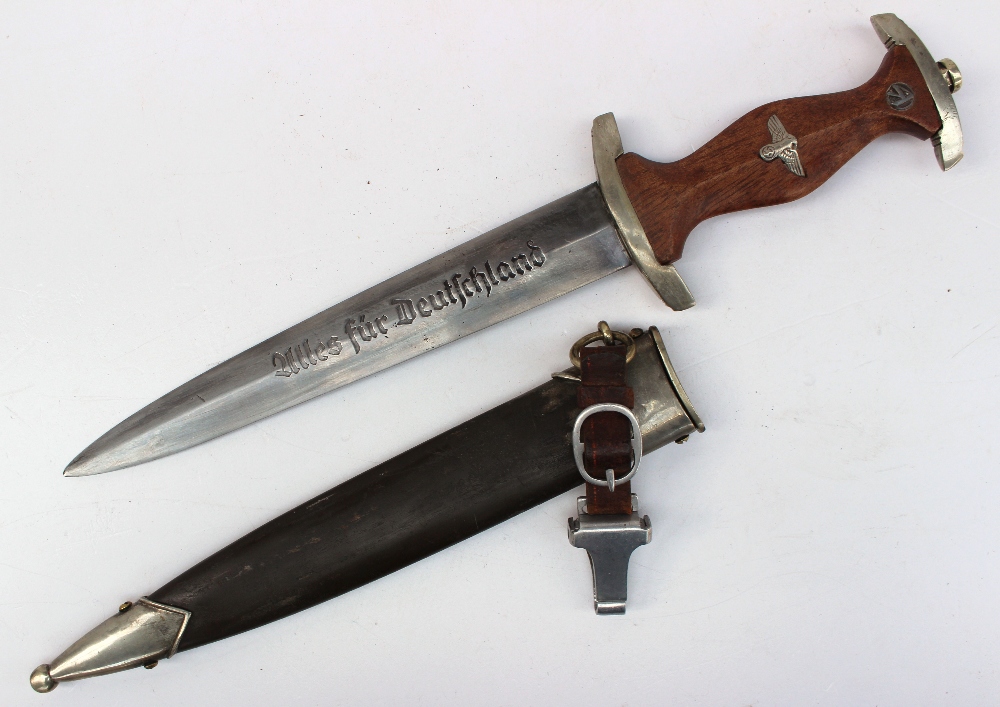 A reproduction Nazi SA dagger with regulation hilt, 'Alles fur Deutchland', etched blade,