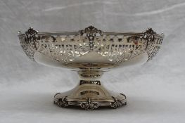 An Elizabeth II silver pedestal bowl with a pierced rim on a spreading foot with bead and leaf