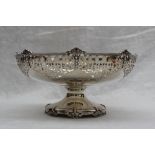 An Elizabeth II silver pedestal bowl with a pierced rim on a spreading foot with bead and leaf