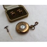 A gold plated half hunter keyless wound pocket watch,