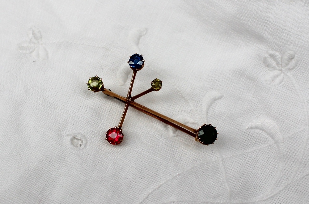 A 15ct yellow gold Southern Cross Brooch, set with a ruby, sapphire,