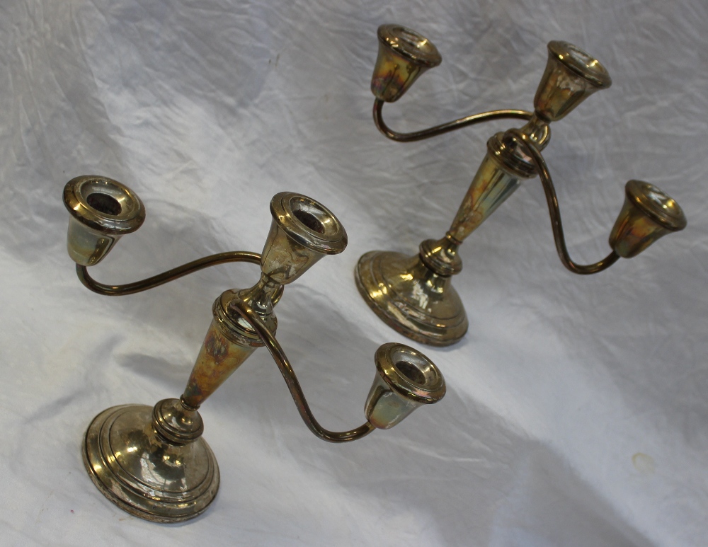 A pair of white metal two branch candelabra with scrolling arms , - Image 2 of 2