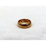 A 22ct gold wedding band,