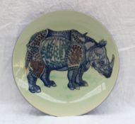 A Dennis China Works pottery sample plate decorated in the Rhino pattern,