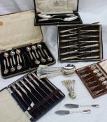 A cased set of twelve silver coffee spoons and sugar nips, Sheffield, 1933,