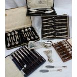 A cased set of twelve silver coffee spoons and sugar nips, Sheffield, 1933,