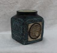A Troika pottery vase of cube form,decorated with an arch,