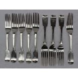 A set of four Victorian silver fiddle pattern table forks, London, 1861,