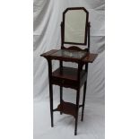 A 19th century mahogany washstand the back with a rectangular mirror above a marble top and shelves