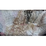 Lace table cloths together with assorted linen