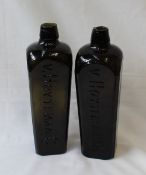 A pair of Hoytema & C green glass gin bottles of square tapering form,