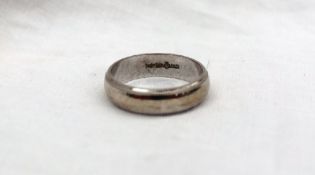 A 9ct white gold wedding ring approximately 5 grams