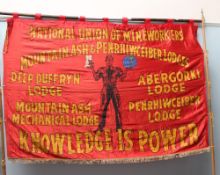 A National Union of Mine Workers banner,