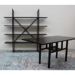 A black ash Titti Fabiani dining table with a fold over top on square legs together with a matching