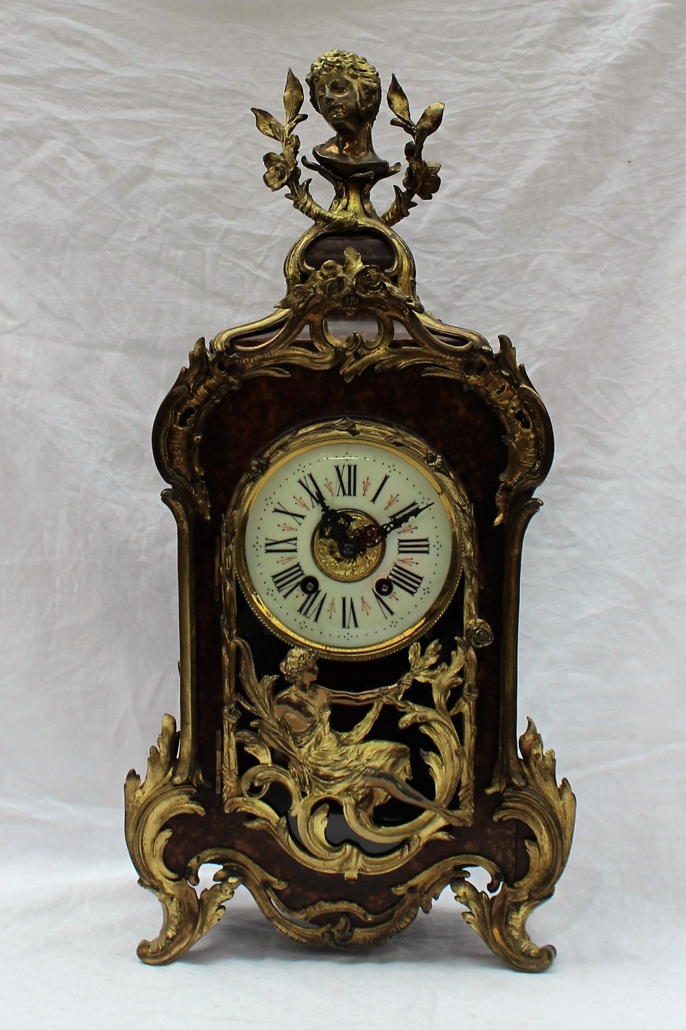 A late 19th century tortoiseshell and ormolu mounted bracket clock,