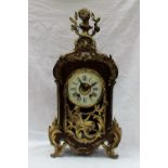 A late 19th century tortoiseshell and ormolu mounted bracket clock,