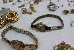 A 9ct gold lady's Ingersoll wristwatch together with a stick pin and assorted costume jewellery