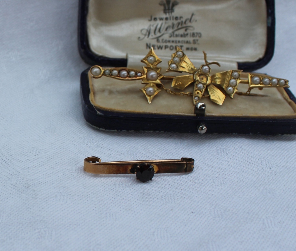 A yellow metal bar brooch in the form of a butterfly set with half pearls, marked 9, - Image 4 of 4