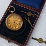 A yellow metal fob watch, the dial engraved to the centre with flowers and leaves,