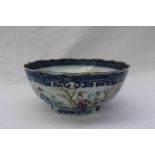 A Chinese porcelain bowl, with a shaped rim,