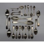 A pair of George IV silver table spoons, London, 1823, together with other silver spoons,