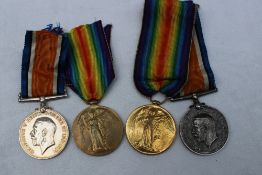 A pair of World War I medals the Victory medal and the British War medal issued to 68118 Gnr G W