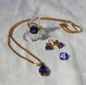 A suite of modern tanzanite jewellery comprising a single stone ring set with a square cushion