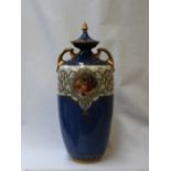 A Royal Worcester porcelain twin handled vase and cover,