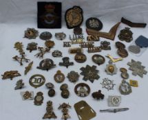 Assorted cap badges and buttons including Egypt SWB, RAMC, Royal Welsh Fusiliers, RAF, The Welch,