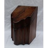 A George III mahogany knife box, with a serpentine front enclosing a vacant interior,