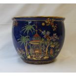 A Carlton Ware Persian pattern jardiniere, with jewelled decoration to a mottled blue ground,