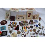 Three World War I medals including the 1914-15 Star, British War Medal and Victory medal,