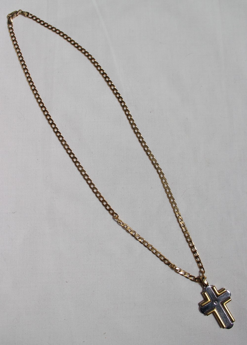 An 18ct yellow gold cross set with a single round brilliant cut diamond approximately 0. - Image 2 of 2