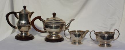 A late Victorian four piece teaset, comprising a teapot, hot water jug, cream jug and sugar basin,