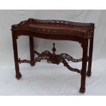 A George III style mahogany silver table,