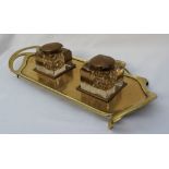 An Art Nouveau brass desk standish, of rectangular form with tendrils,